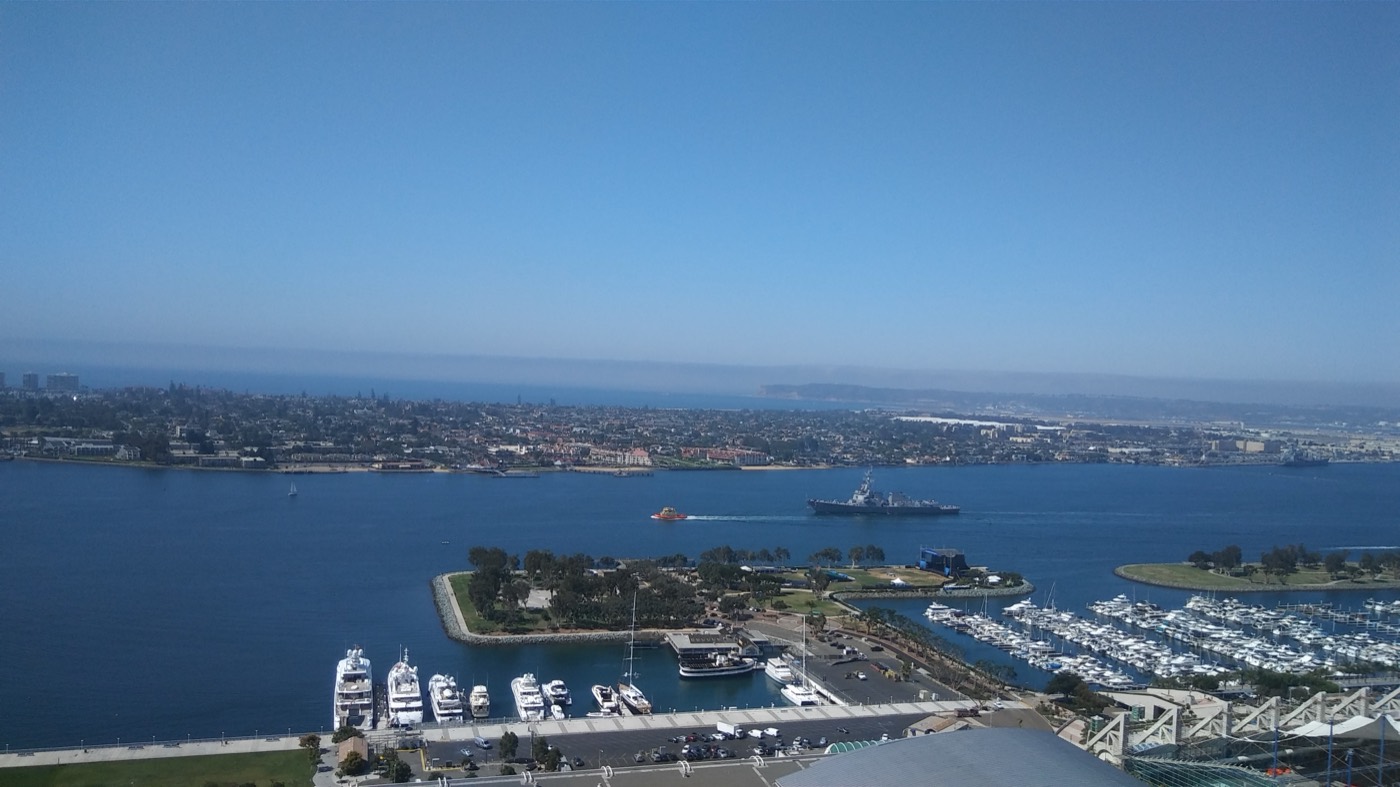 Panoramic aerial view of San Diego Bay from high-rise rooftop
