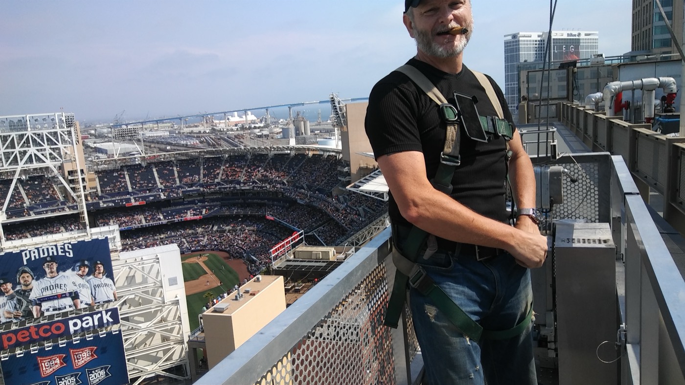 Rope access technician on Marriott Hotel rooftop, San Diego